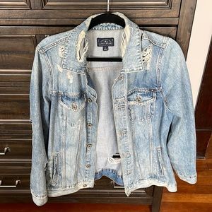 Distressed denim jacket size L